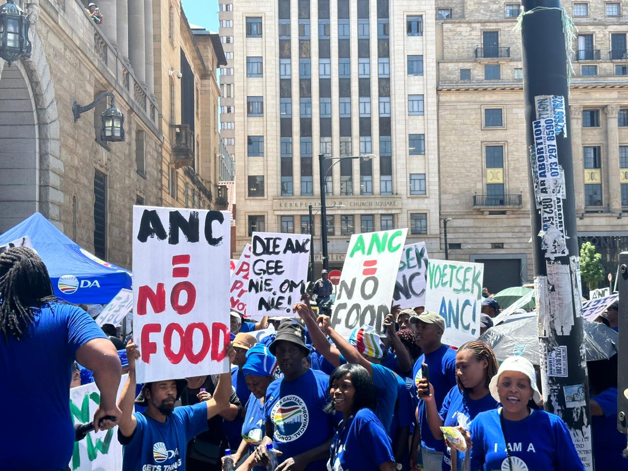 DA members outside the office of the Minister of finance in Pretoria demand zero vat on food