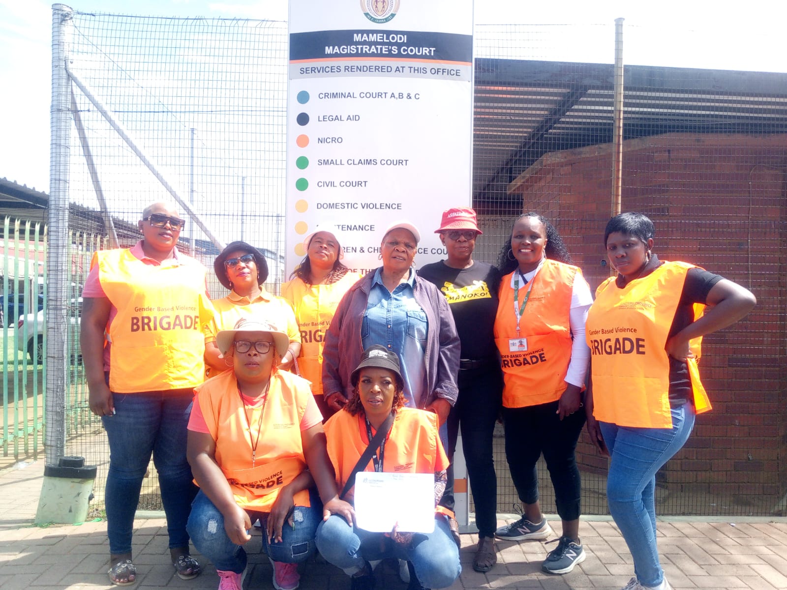 Mamelodi east GBV brigade members and the family of the late Mmanoko Tauyatswala outside the Mamelodi Magistrate court.