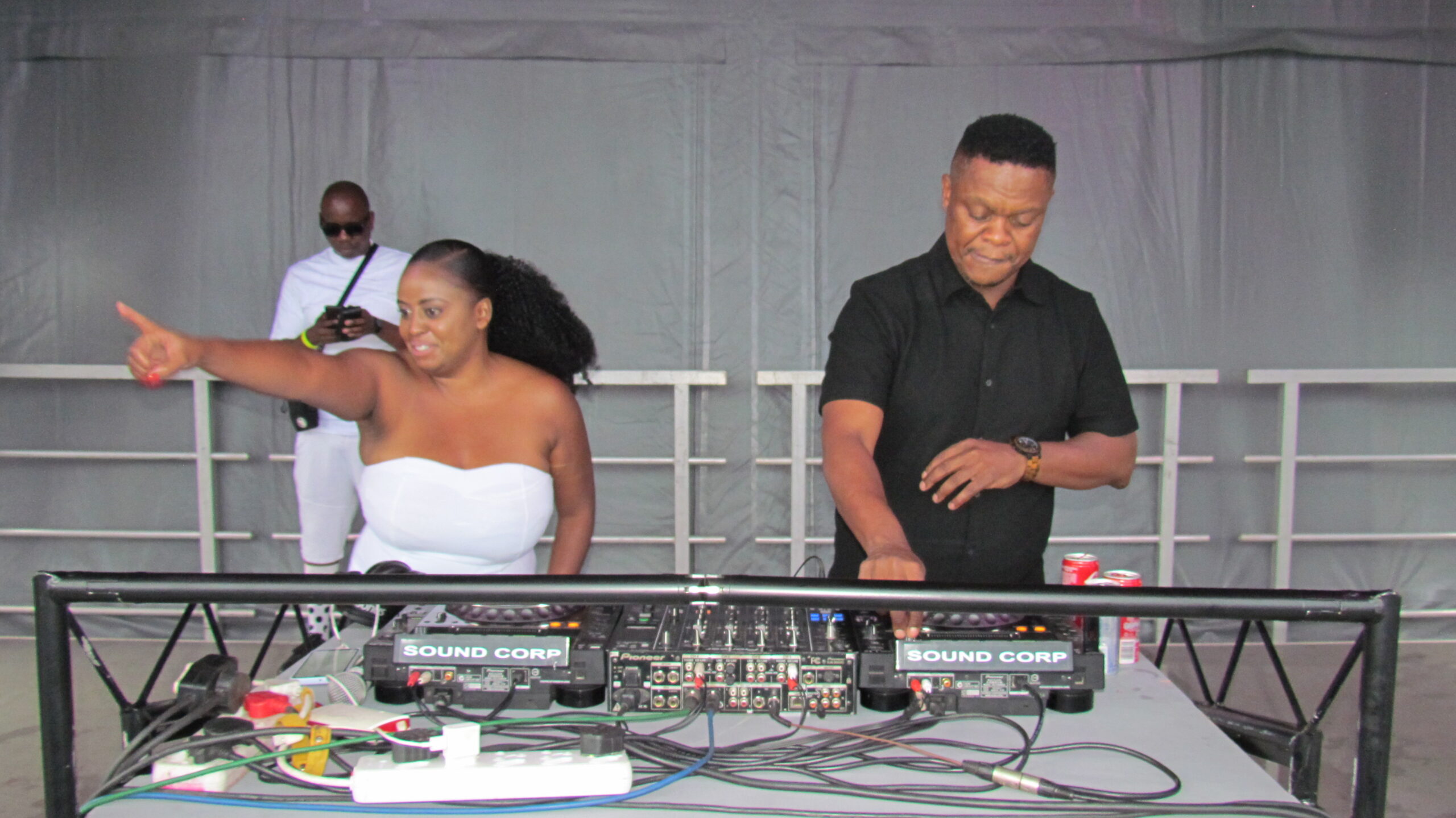 Peter Mashata preforming next to the gorgeous radio host and VO artist Dubbz- Lucy  Bodumele MC for the day at Mamelodi All White picnic event in Mamelodi West, Tshwane 