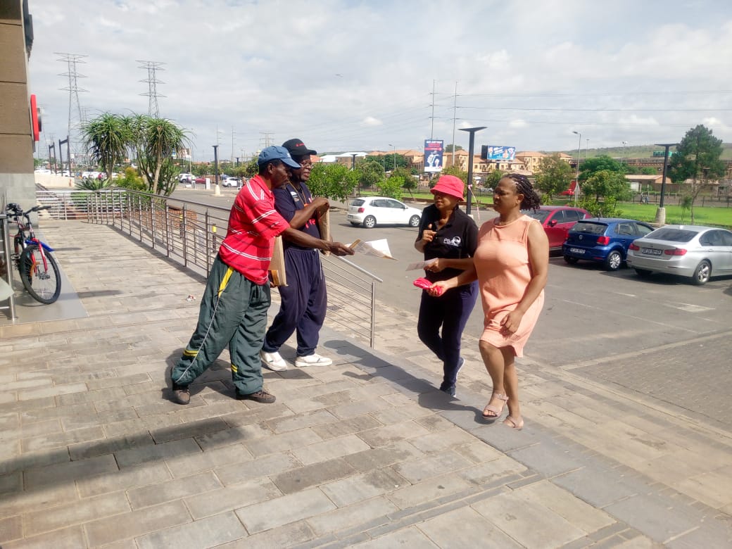 Members of Mamelodi Men's forum handing out pamphlets to public in Mamelodi west, Tshwane  