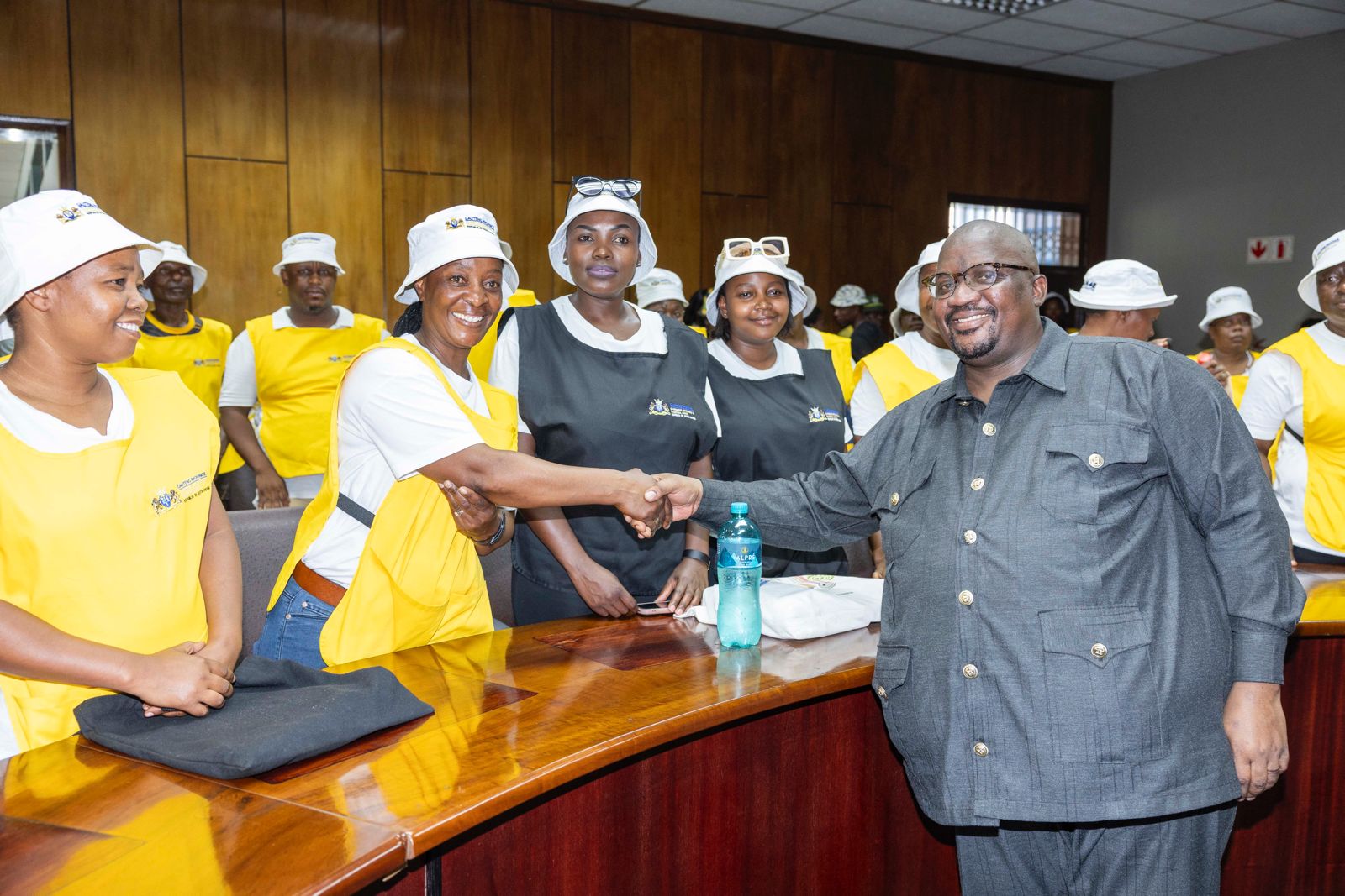 MEC for Cooperative Governance and Traditional Affairs, E-Government, Researcher and Development Mzi Khumalo greeting the new civic ambassadors