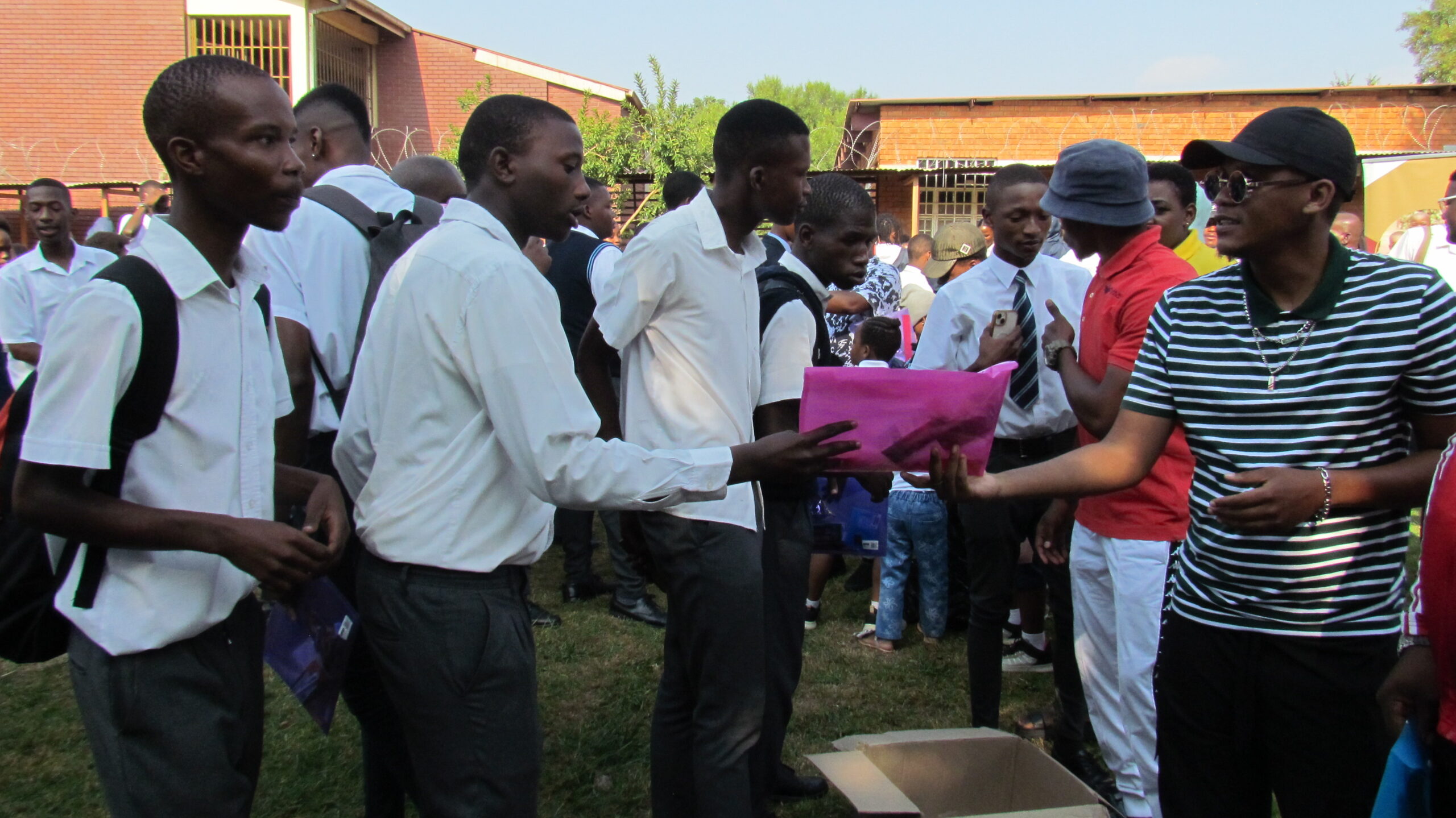 Skeem Saam actor Patric Seleka hand out stationery to matric learners at Jafta Mahlangu secondary school in Mamelodi West, Tshwane