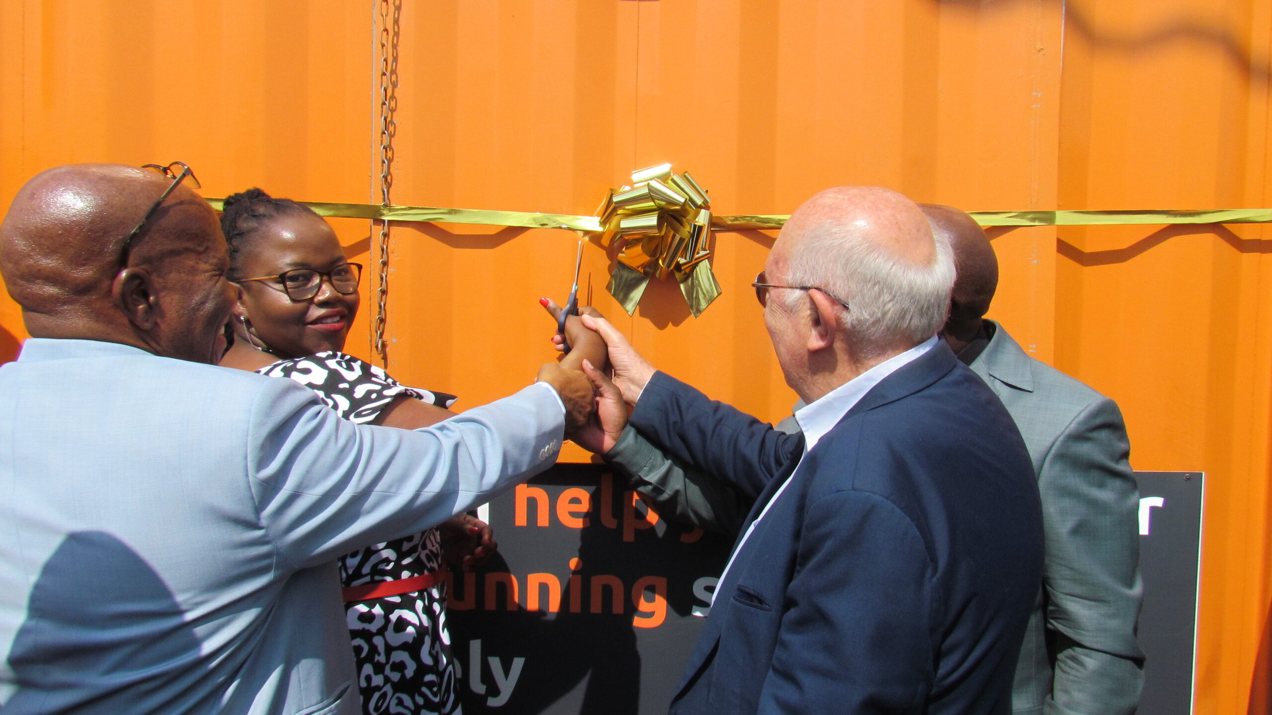 SANTACO president Abner Motlhabane Tsebe, Gauteng MEC for transport Kedibone Diale- Tlabela cut a ribbon to a newly spare parts shop in Olievenhoutbosch, Tshwane