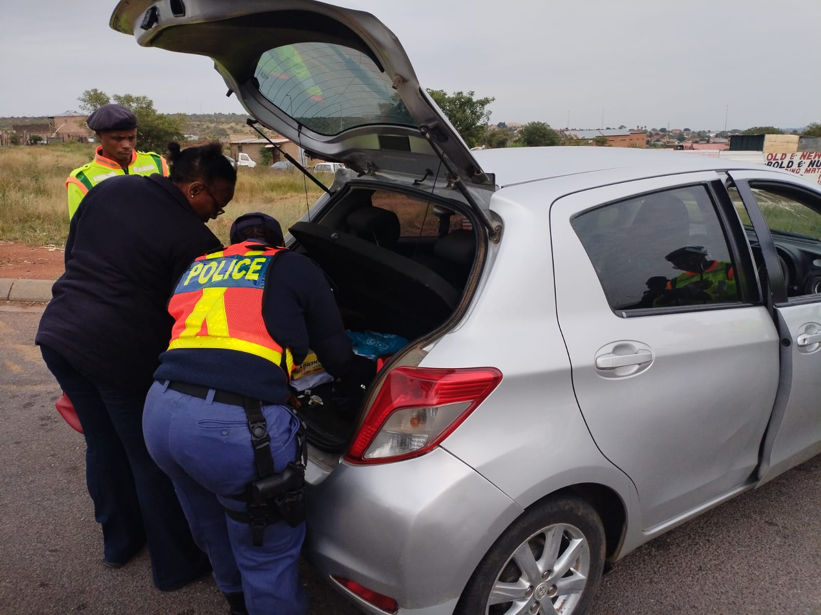 SAPS searching a car in a road block in Rietgat, Soshanguve 