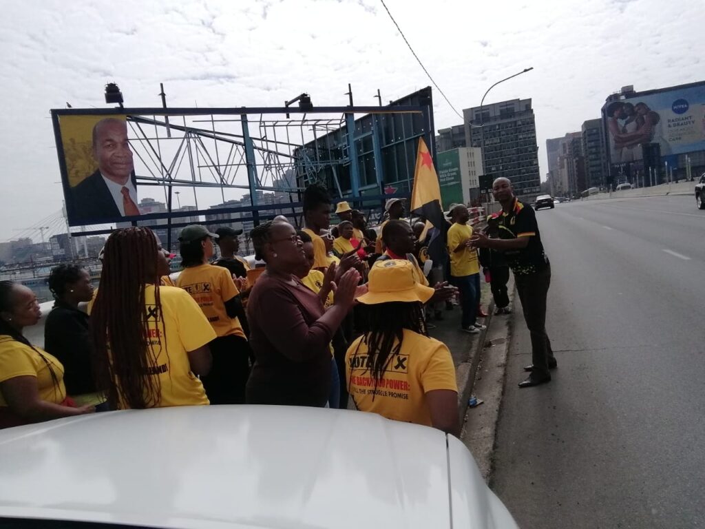 Azapo members picketing next to the billboard that was vandalised again in Johannesburg