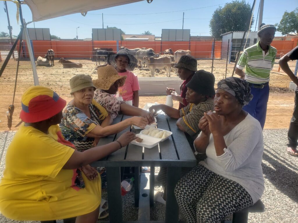 Residents taste the delicious meat cooked during the officially launched of the restaurant in Mamelodi east, Tshwane photo by Dimakatso Modipa