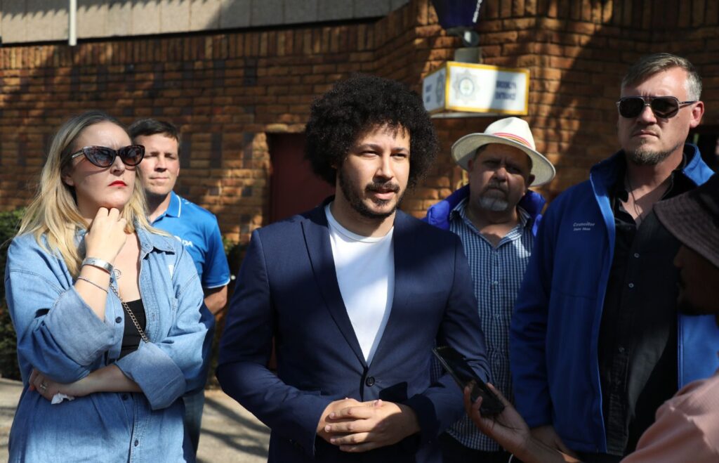 Tshwane DA members outside Brooklyn police station after opening a case Tshwane councilor against 