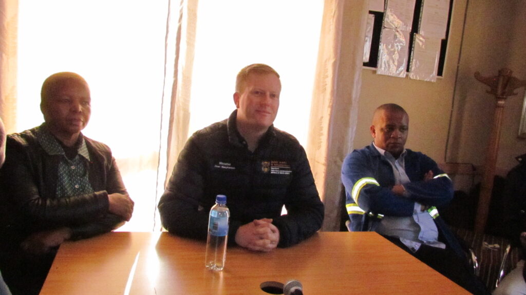 Ward 28 councilor Joyce Seelane, Public Works and Infrastructure Development Minister Dean McPherson and MMC for Human Settlements Ofentse Madzibatela 