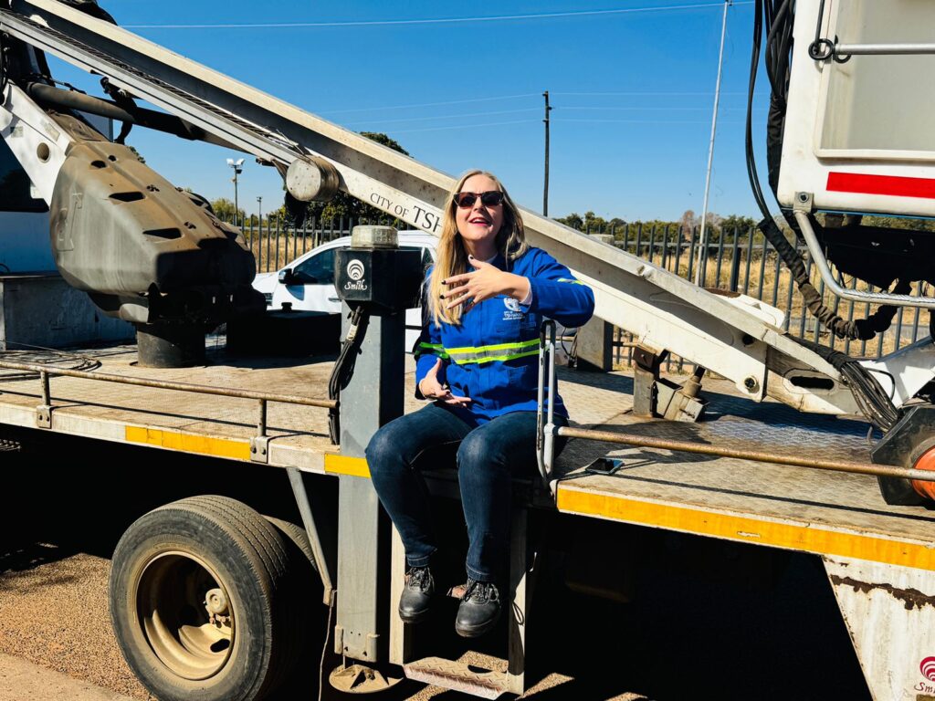 MMC for Finance in the City of Tshwane Jacqui Uys sitting in a cherry picker truck used to disconnect electricity to indebted residents