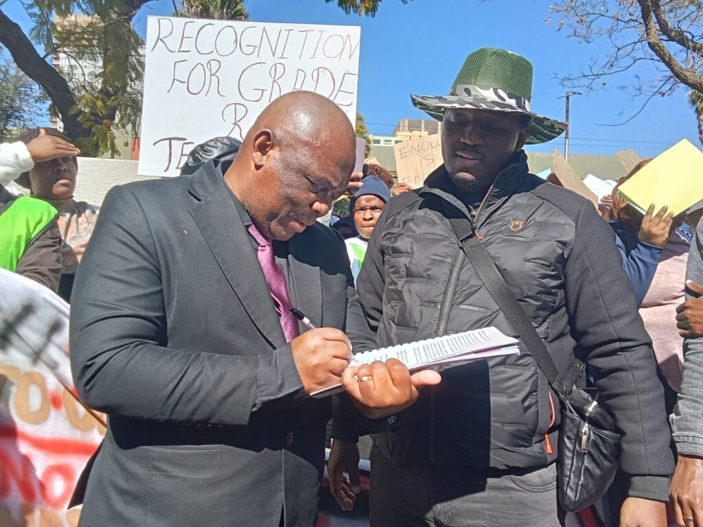 Director education labour relation and condition of services David Ntloana sign a memorandum photo by Dimakatso Modipa 