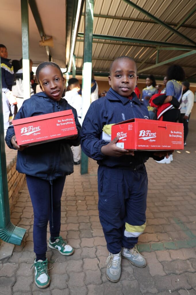 Grade 3 learners at Matlapeng Primary School Atlegang Maponyane and Keagile Moeng with the brand new shoes