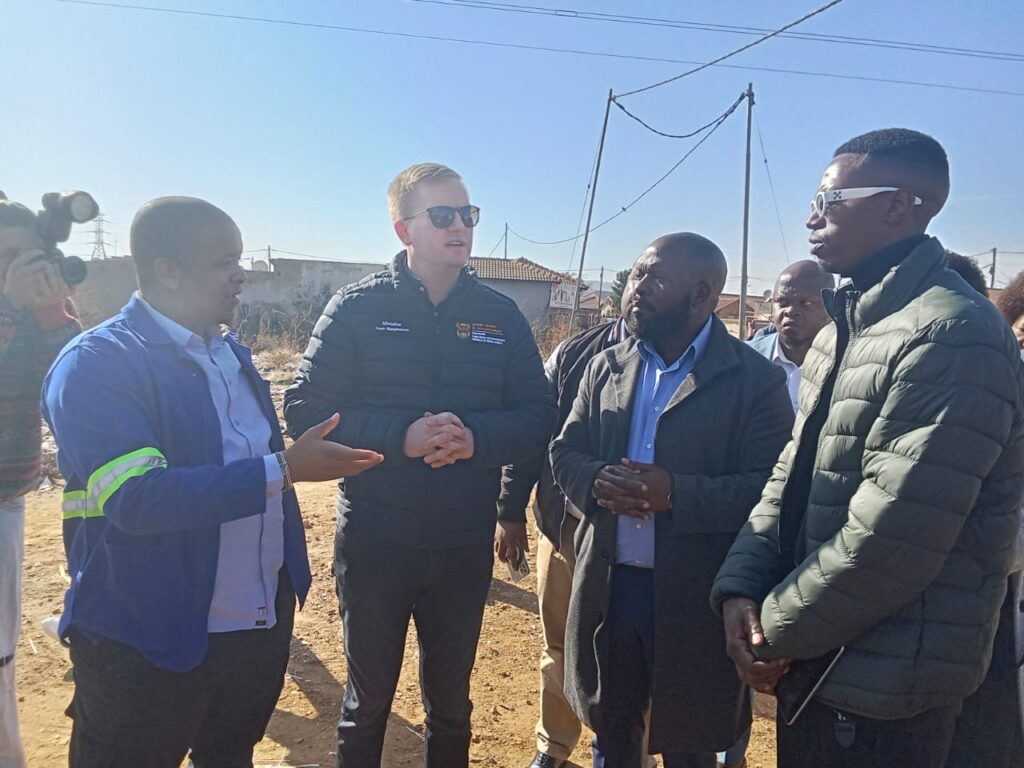  MMC for Human Settlements Ofentse Madzibatela,  Public Works and Infrastructure Development Minister Dean McPherson and Skateboard club founder Poelo Mofolo in Mamelodi east, Tshwane 