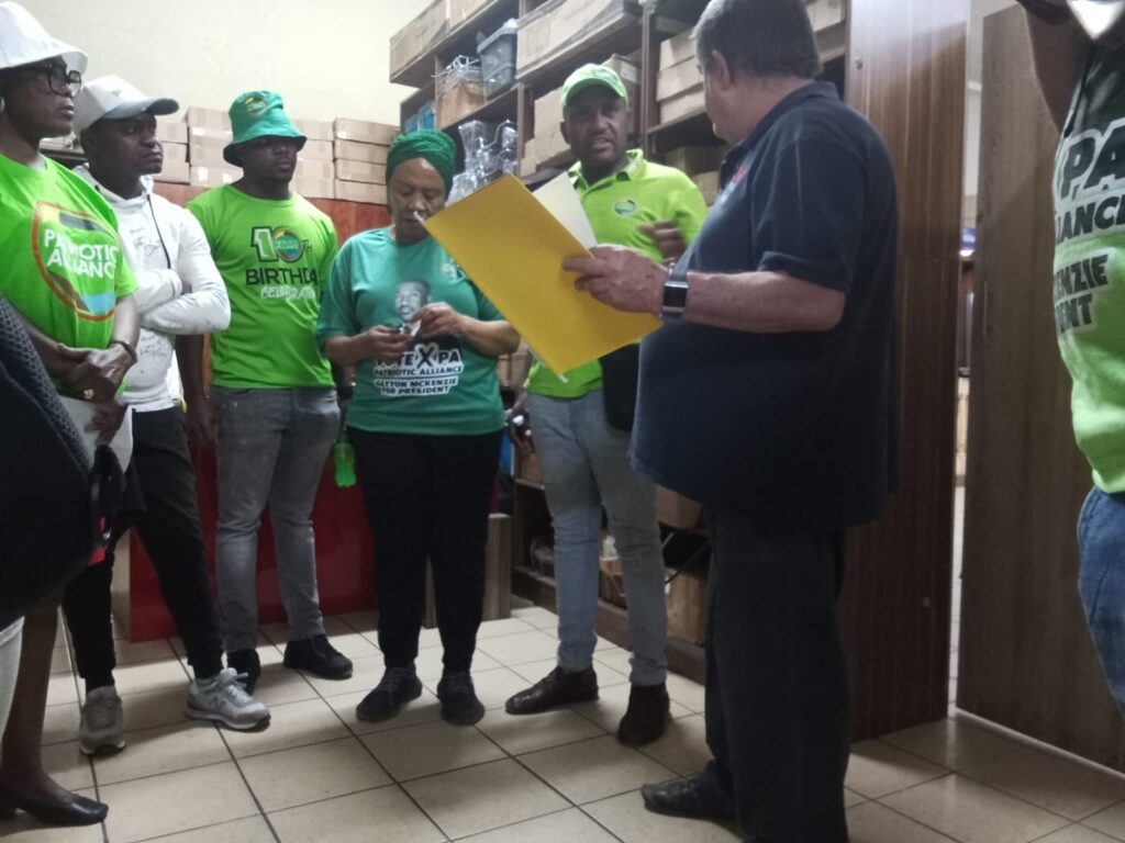 Members of the Patriotic Alliance confronting the manager at HDS Cut and Edge company photos by Dimakatso Modipa