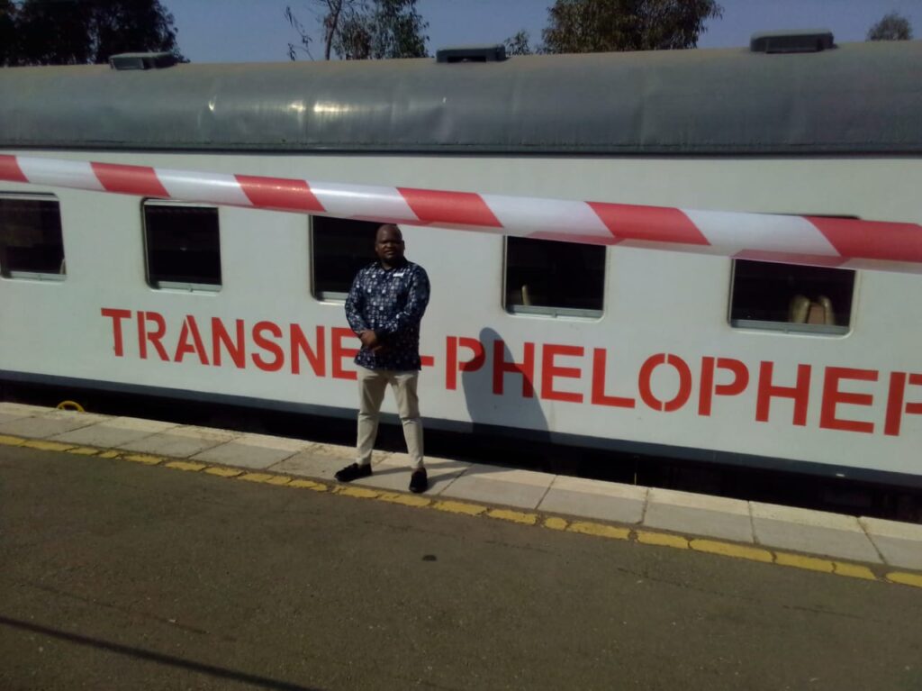 Phelophepha Health Trains Manager Bheki Mendula standing in front of the train compartments that are used for consultation by patients at the Eerstefabrieke railway station in Mamelodi photo by Peter Mothiba