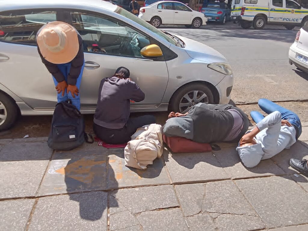 Some of Technical Vocational Education and Training (TVET) students sleeping at department of higher, education and training photo by Dimakatso Modipa 