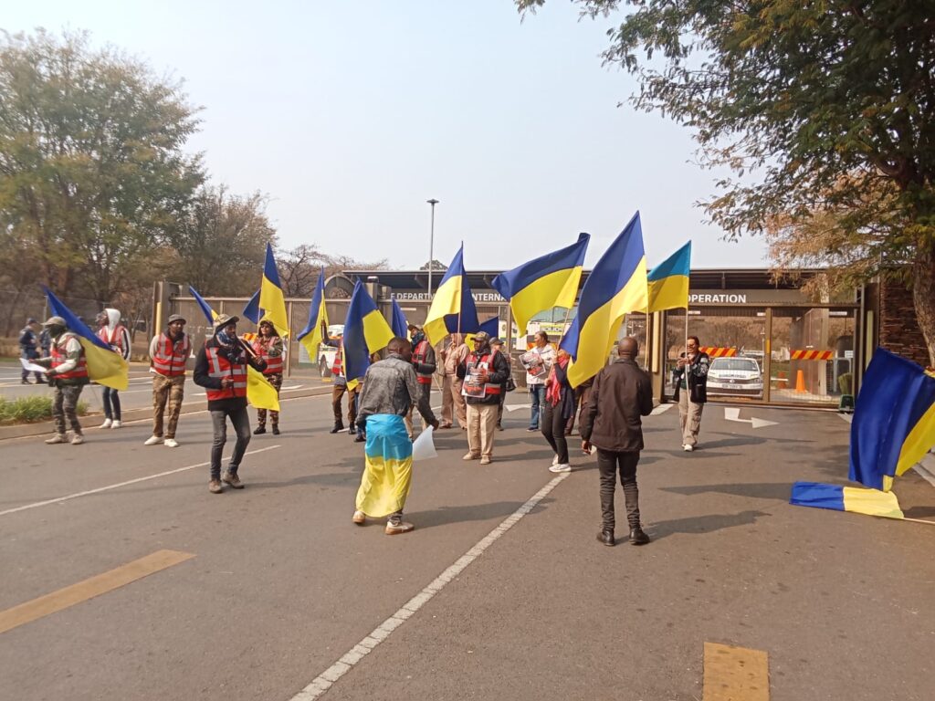 Sofasonke party member in DIRCO offices picketing photo by Dimakatso Modipa