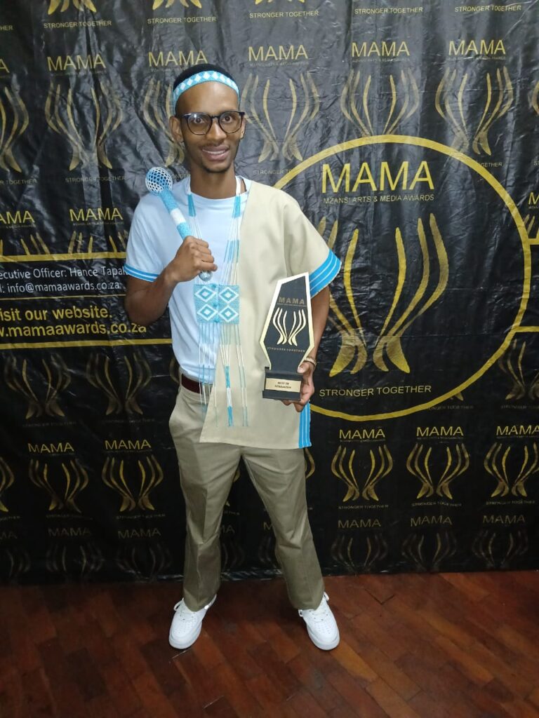 DJ Sthamzen with the award he won at the Music Arts and Media Awards