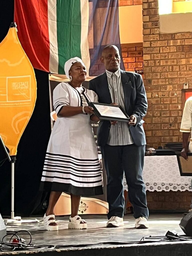 Motale being congratulated by former City of Tshwane MMC Eulenda Mabusela