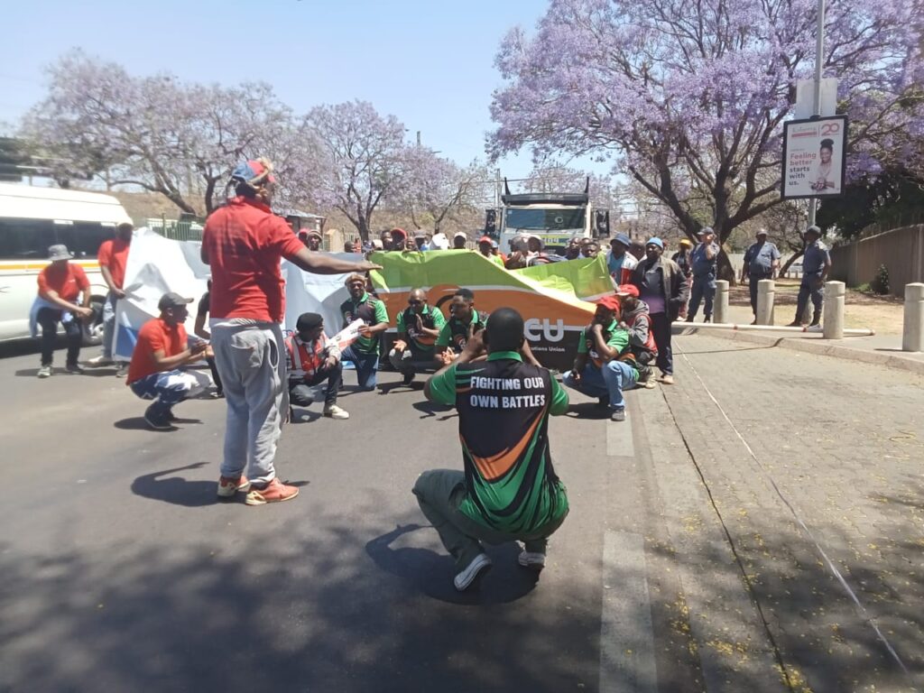 South African Post Office workers union DEPACU marched to the National  Treasury offices in Tshwane demanding that the fiscus body must pay out billions of rand as promised to  bail out the South African Post Office photo by Dimakatso Modipa