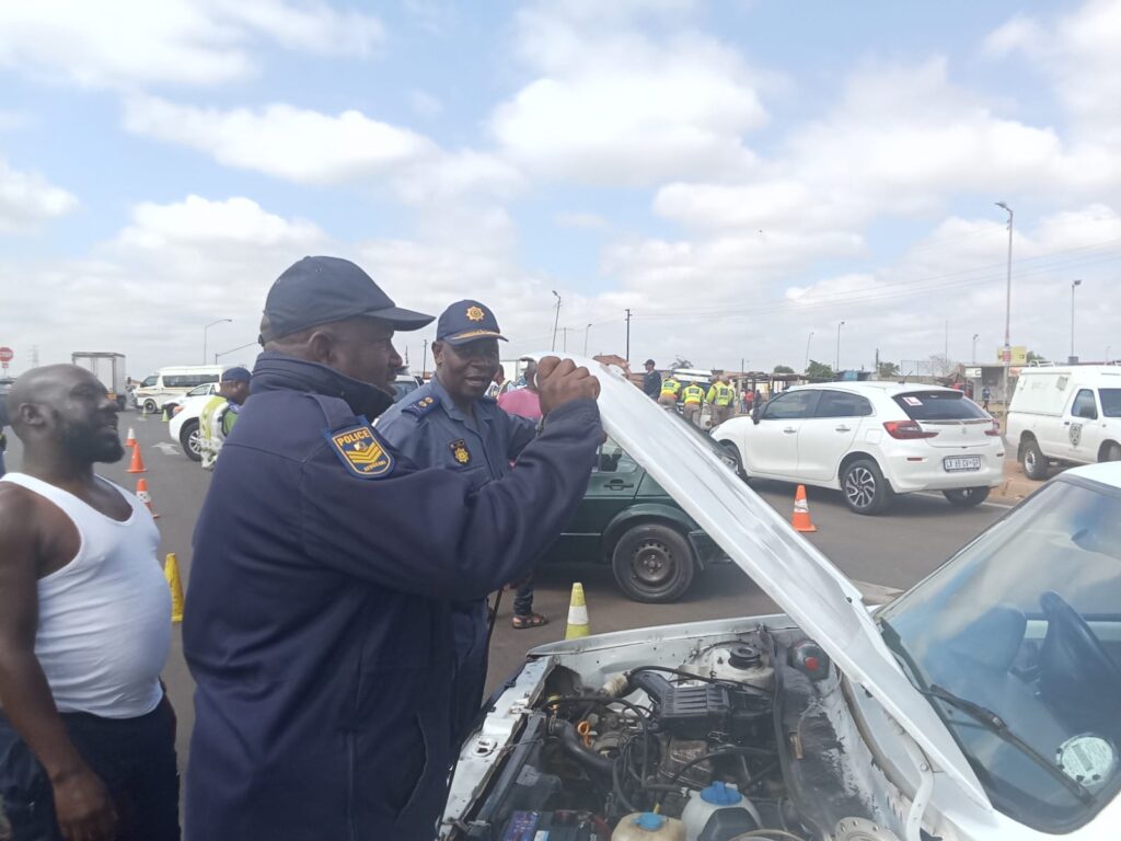 Tshwane District Commissioner Major General Samuel Thine inspecting a vehicle in Mamelodi during Operation Shanela 