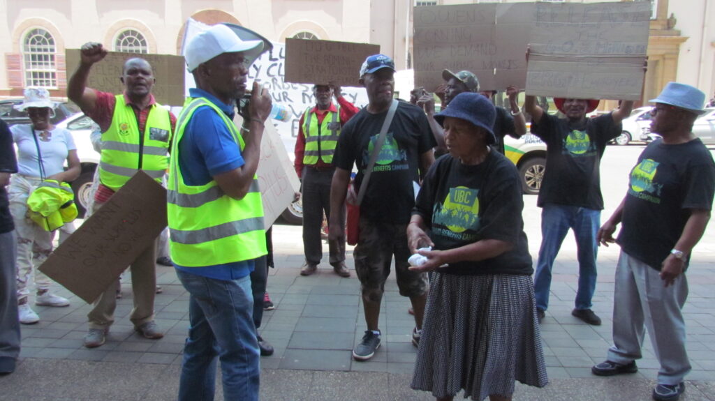 Members of lobby group Unpaid Benefits Campaign (UBC) staged a march to the offices of the National Treasury 