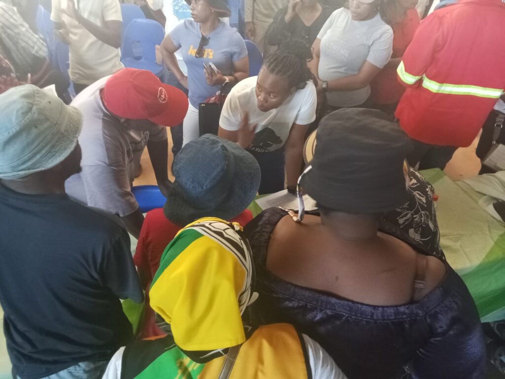 City of Tshwane Mayor Dr Nasiphi Moya engaging with the residents of Mamelodi after the imbizo at Nellmapius hall on Saturday afternoon photo by Dimakatso Modipa