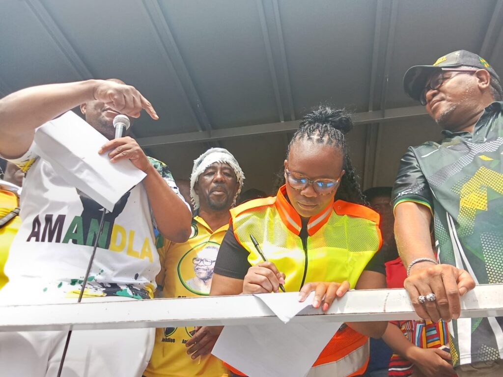 City of Tshwane mayor Dr Nasiphi Moya sign a memorandum