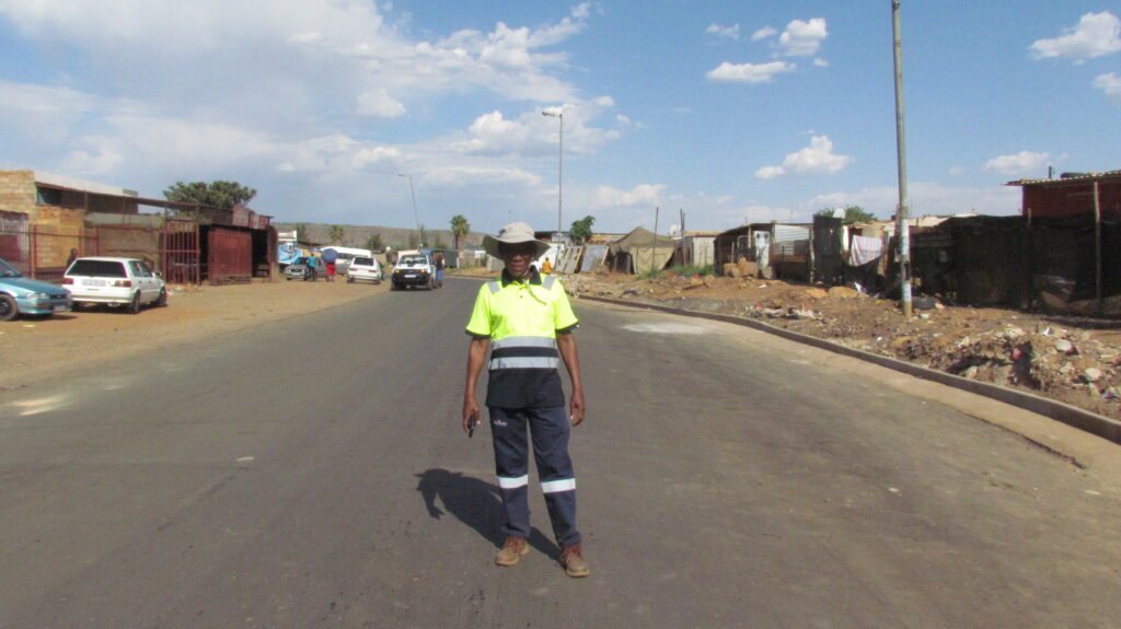 Ward 40 Councillor Makola is happy that the Mohwelere Road in Phomolong has now been fix photo by Dimakatso Modipa