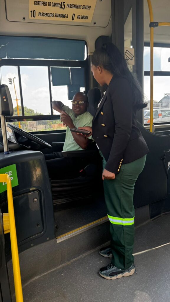 MMC for roads and Transport Tlangi Mogale engage with bus driver