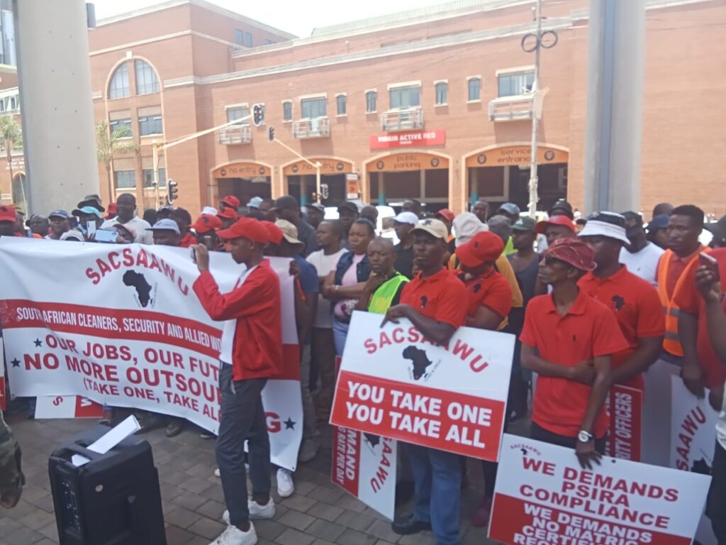 South African Cleaners Security and Allied Workers Union (SACSAAWU) members protest outside the Tshwane House demanding that the City of Tshwane Metro must insource all cleaners and security guards' photo by Dimakatso Modipa