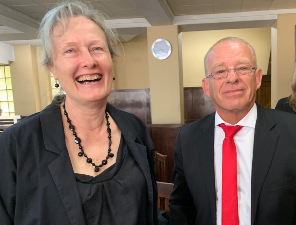 Monique van Oosterhout flanked by veteran lawyer Advocate Gerrie Nel at the Johannesburg Magistrates Court on Friday