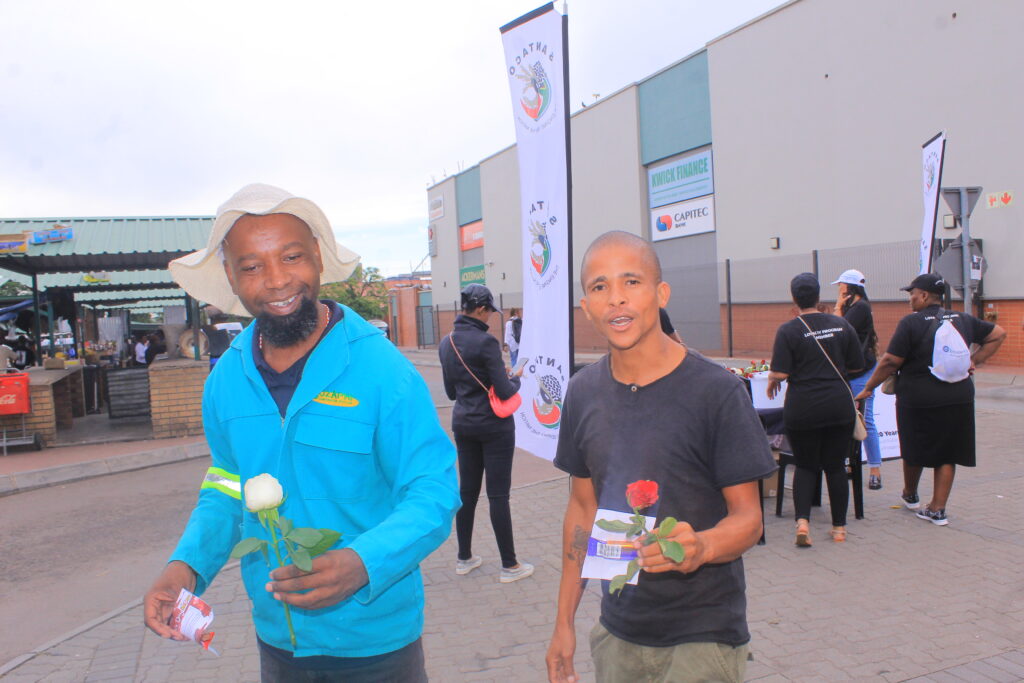 Male passengers happy to get flower and chocolate from SANTACO on valentine's day 