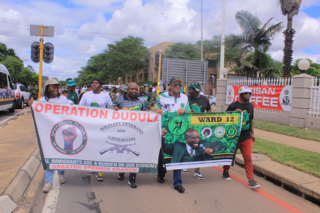 Operation Dudula members and MKP members marching to Brooklyn police station against Zanzou night club photo by Dimakatso Modipa