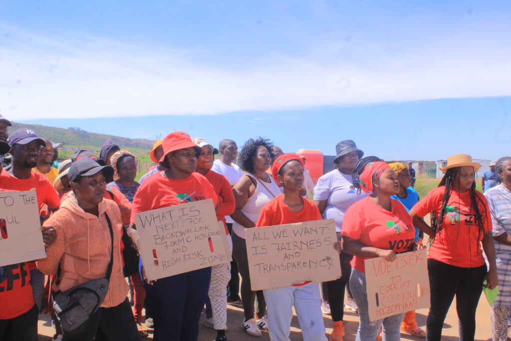 EFF members at the relocation site