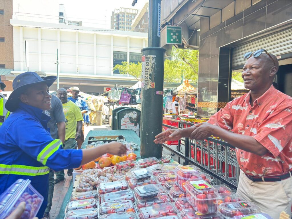 City of Tshwane mayor Dr Nasiphi Moya engaging with the street vendors in CBD 