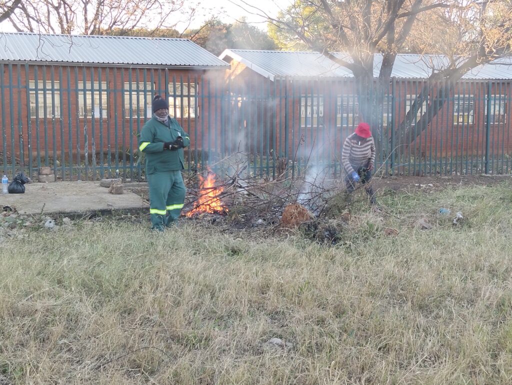 Residents burned rubbish at the illegal dumping 
