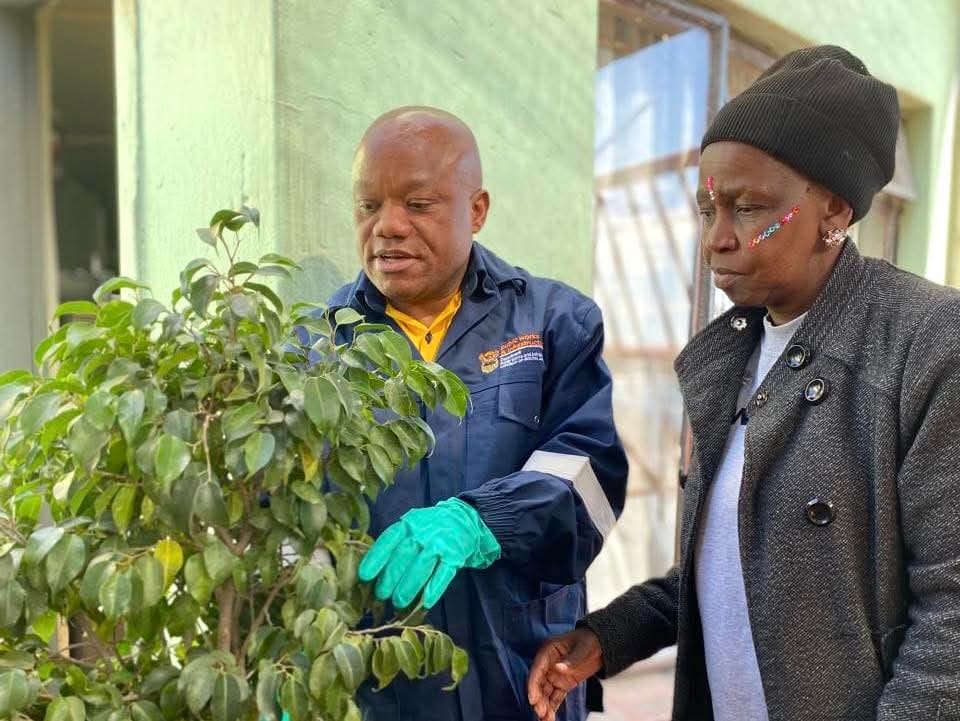 Deputy Minister  Sihle Zikalala flanked by Give Them Hope Foundation CEO Matshidiso Mothiba at the tree-planting ceremony 