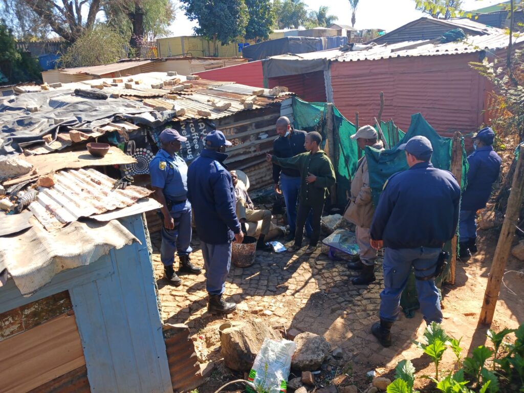 SAPS members inspecting illegal shebben in Ekangala during operation sanela  photo supplied 
