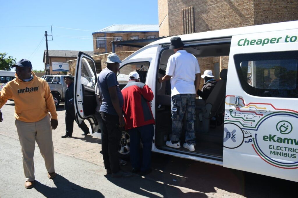 Passengers in an electric mini bus taxi in Soshanguve 