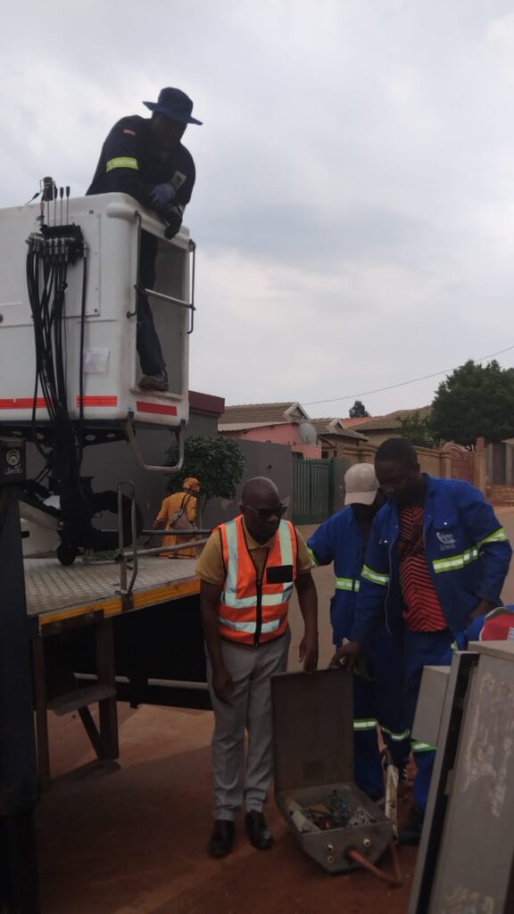 MMC for Utilities in the City of Tshwane Frans Boshielo with city of Tshwane electricity team in Lusaka, Mamelodi east, Tshwane 