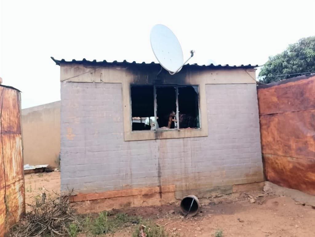 The house of the suspect burned down allegedly by armed men photo supplied