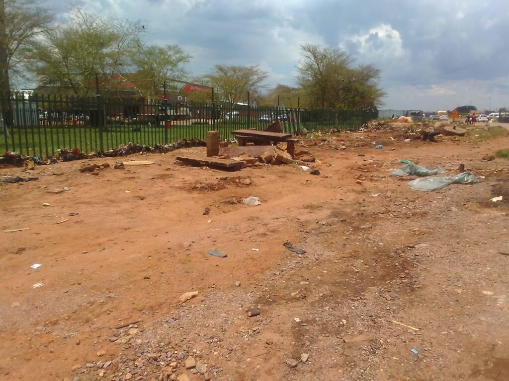 The fence near Mams Mall now looks a bit clean after shacks and stalls were demolished there on Wednesday by TMPD officials and Red Ants photo by Peter Mothiba