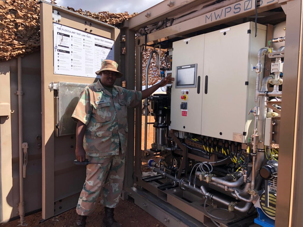 Sergeant Morabe of the SA Army Engineer Formation demonstrates the operation of a Mobile Water Purification System (MWPS). Photo by Zinhle Bhuda