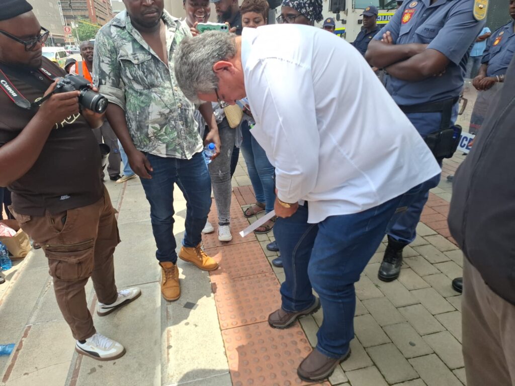 Security officers marching at Tshwane House 