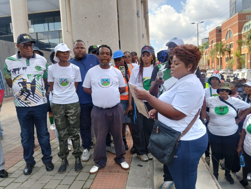 One of the security guards Winnie Mtshweni reading a Memorandum on behalf of security guards photo by Dimakatso Modipa 