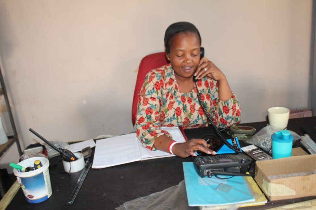 Makhosazana Nkosi, Senior Manager at IMD Upholstery, processes orders.