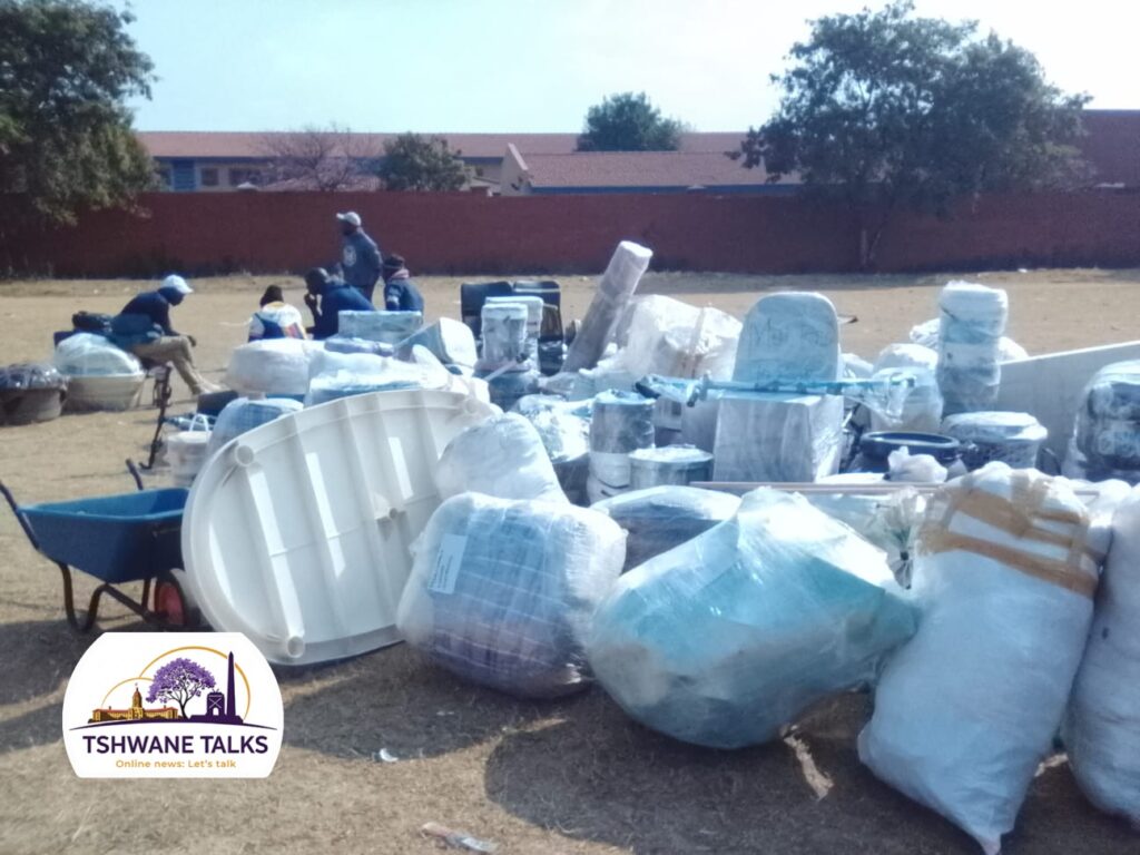 Zimbabweans going home from the Mamelodi East Police Station photo by Peter Mothiba