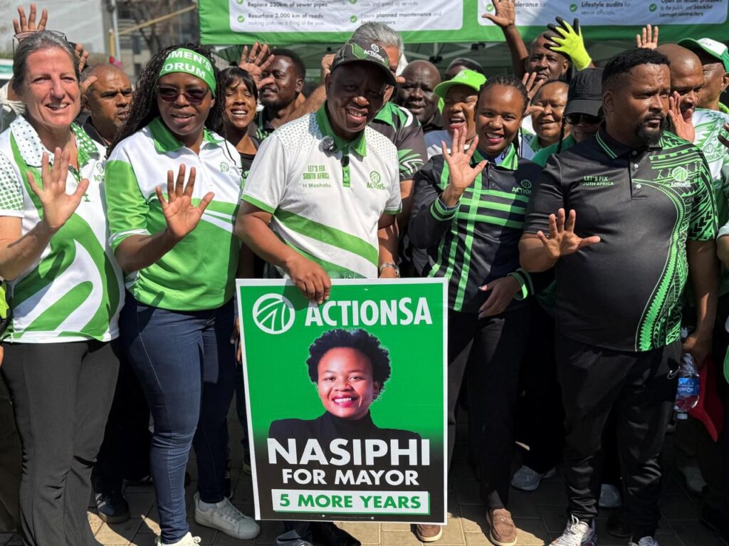 Dr Nasiphi Moya ActionSA Tshwane Mayoral Candidate with ActionSA president Herman Mashaba during poster launch