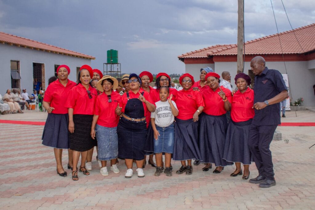Apa Selemela posing with one of the oldest clubs, Vukani, spawned by the Ikageng Women's Club (IWC)