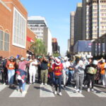 Security guards outside Tshwane House singing and dancing photo by Dimakatso Modipa